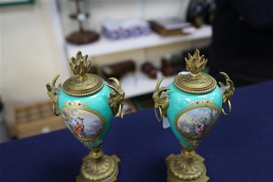 A pair of 19th century French ormolu mounted Sevres style jewelled porcelain cassoulets, height 9in.